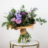 purple flowers bouquet by casa petals flower delivery dubai