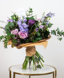purple flowers bouquet by casa petals flower delivery dubai