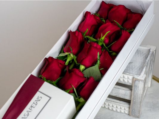 24 red roses in premium flower box by casa petals online flower delivery Dubai